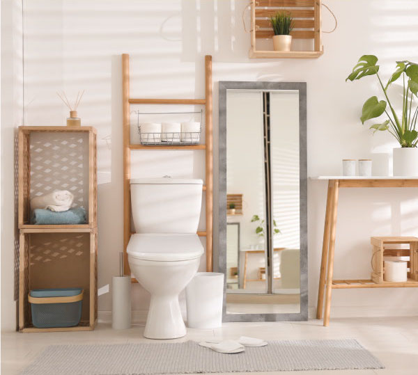 Brondell Swash Thinline installed in a clean white bathroom with wooden accents.