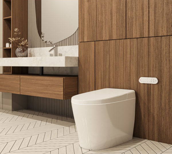 Modern bathroom with the white Sutro Integrated Smart Bidet Toilet, wall-mounted remote, wooden cabinetry, and a floating vanity with marble countertop.