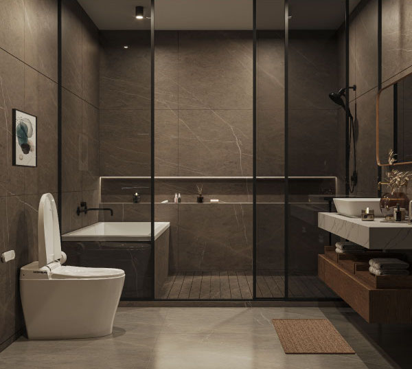 Modern bathroom with the Sutro Integrated Smart Bidet Toilet, open lid, dark stone tiles, glass-partitioned tub, floating vanity, and ambient lighting.