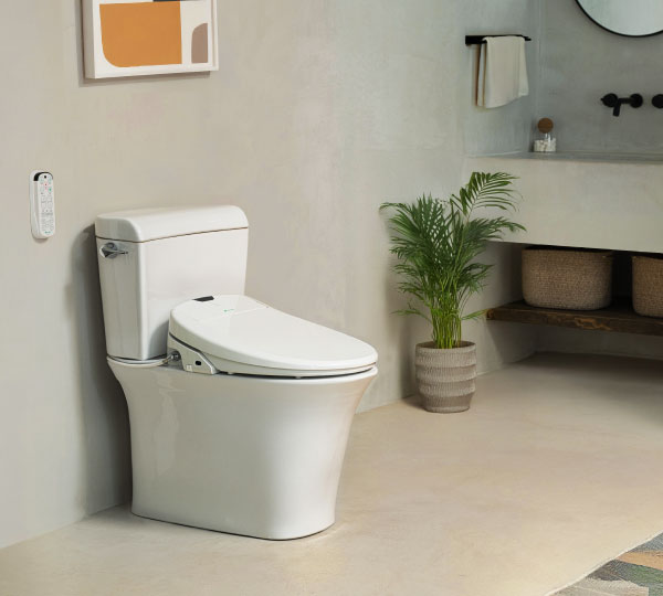 Swash 1400 Luxury Bidet Toilet Seat in a sleek, modern bathroom with wall-mounted control panel, potted plant, vanity area, and minimalist decor.