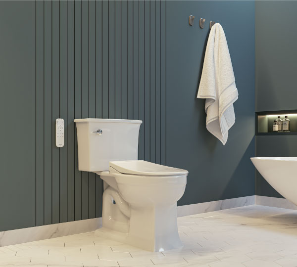 Nebia Yuba 5-Setting Handshower with HaloNetic Double Docking System installed modern bathroom with a blue vanity.