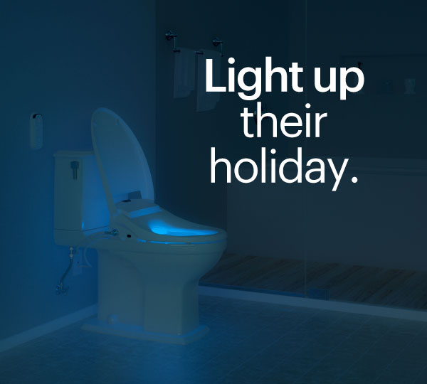 Bathroom at night featuring a toilet with a glowing blue LED nightlight, gentle-close seat and lid, heated seat, and simple DIY installation, creating a cozy, modern ambiance.