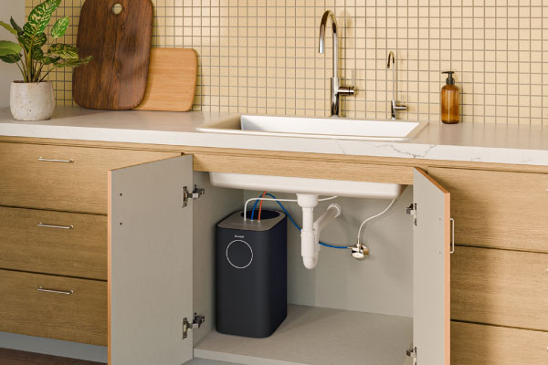 Circle Reverse Osmosis Water Filtration System installed beneath a kitchen sink, featuring a compact tankless design that provides clean, filtered drinking water directly from the tap.