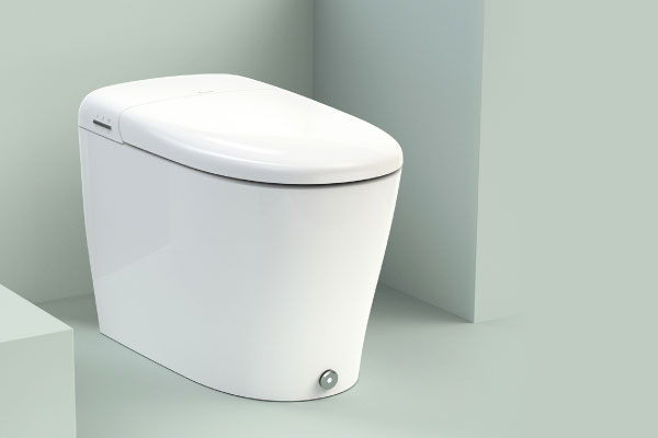 Coit Integrated Smart Bidet Toilet in glossy white with a sleek one-piece design, elongated seat, concealed tank, and smooth modern contours in a minimalist setting.