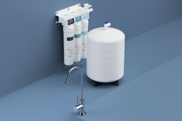 Capella Reverse Osmosis Water Filtration System installed under a modern kitchen sink with green cabinets and wood countertops, highlighting sleek, compact design.